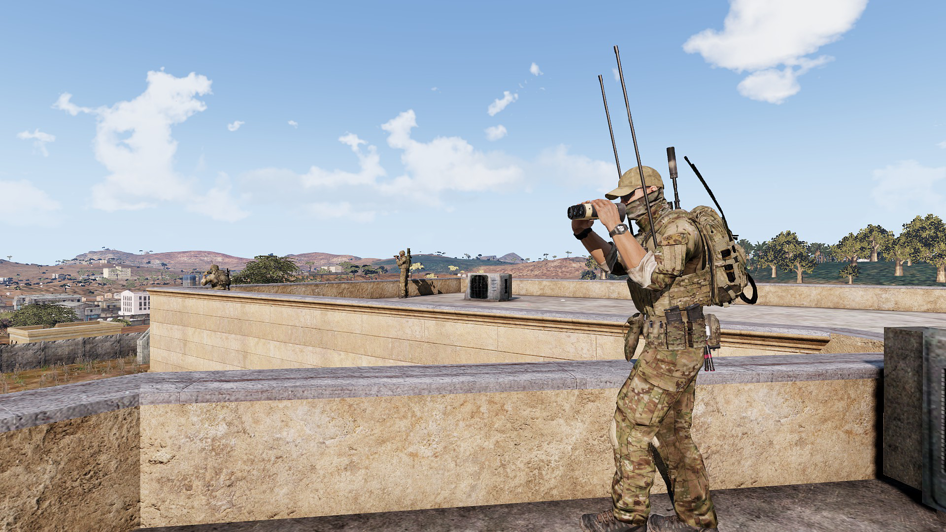 A soldier in camouflage gear stands on a rooftop, looking through binoculars, with a city and hills in the background.