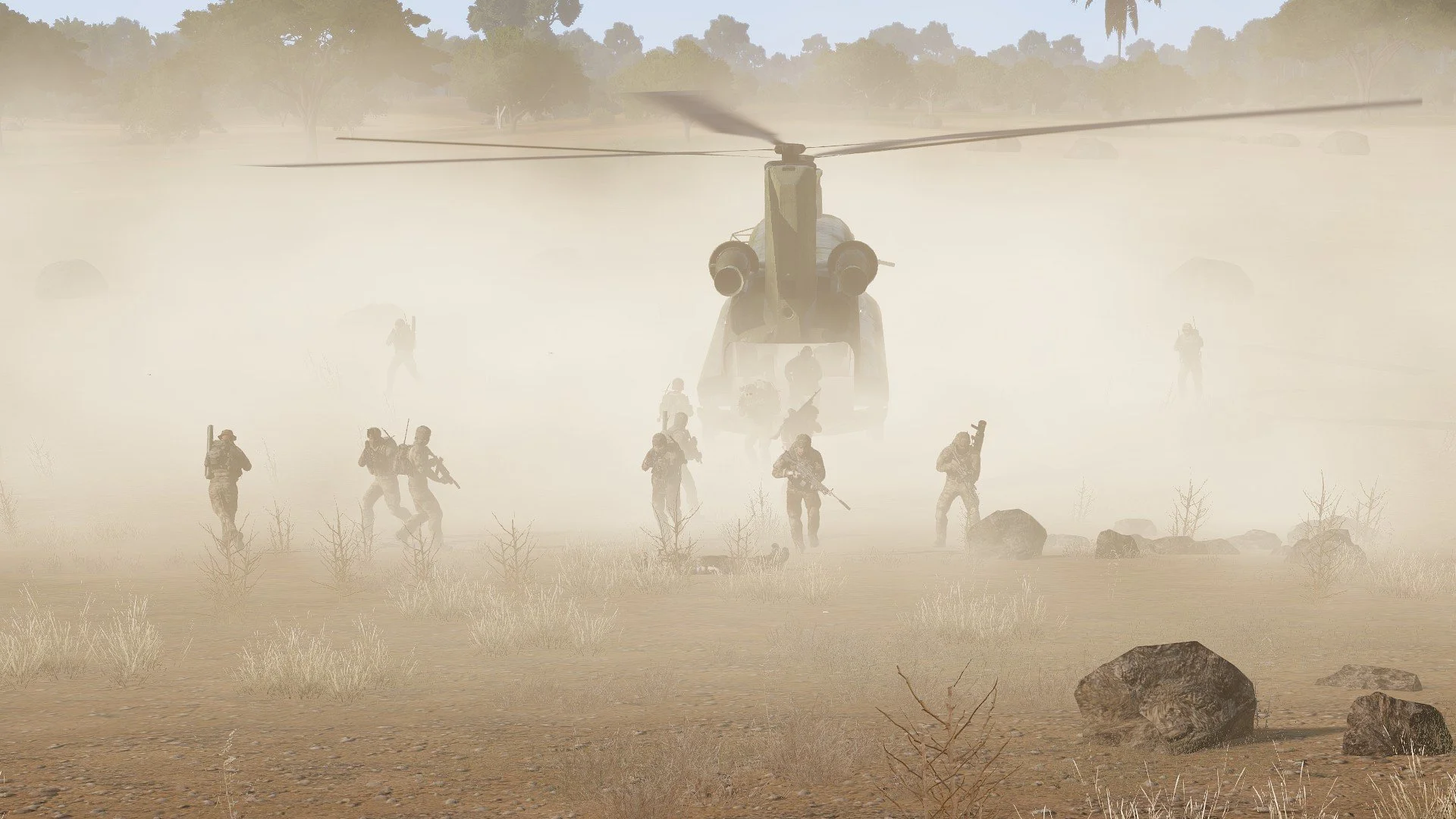 A military helicopter flying over a desert, with soldiers walking and running on the ground amidst dust and rocks.