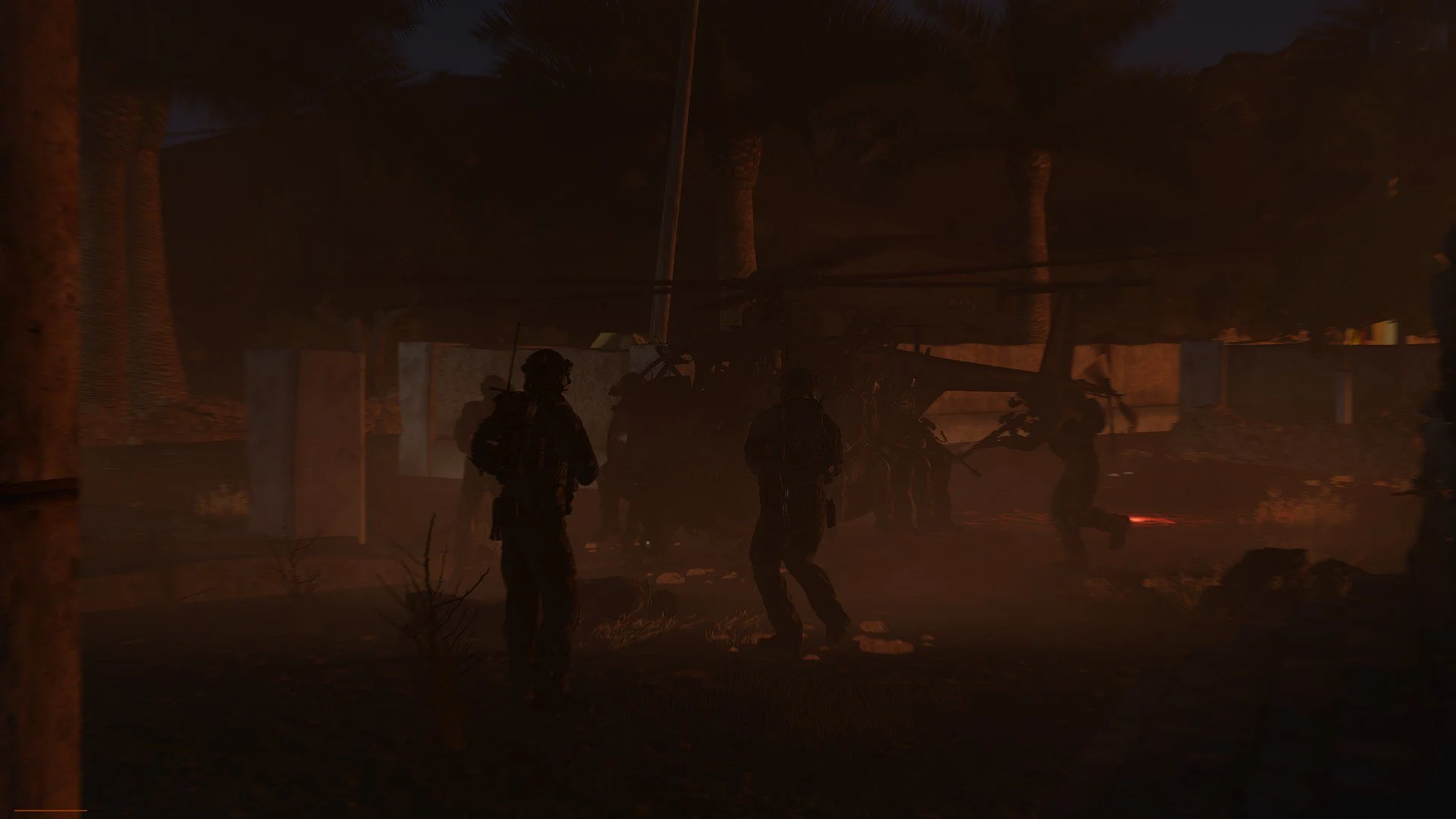 Silhouettes of soldiers and a helicopter in a dark, smoky environment, possibly a military operation or rescue scene at night.